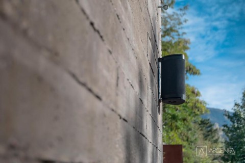 An outdoor speaker connected to a whole-home audio system