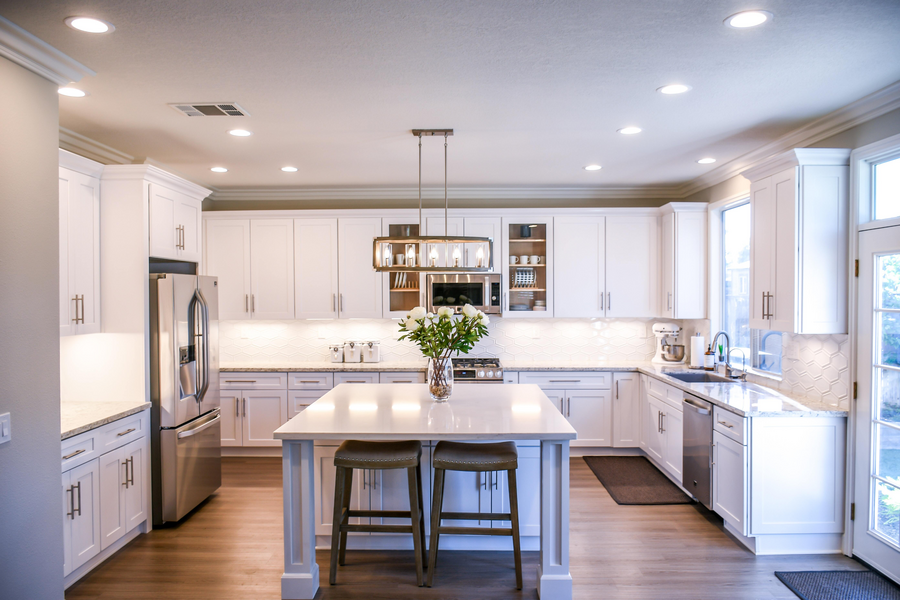 A view of a luxurious living area with motorized shades in a Steamboat Springs home. 